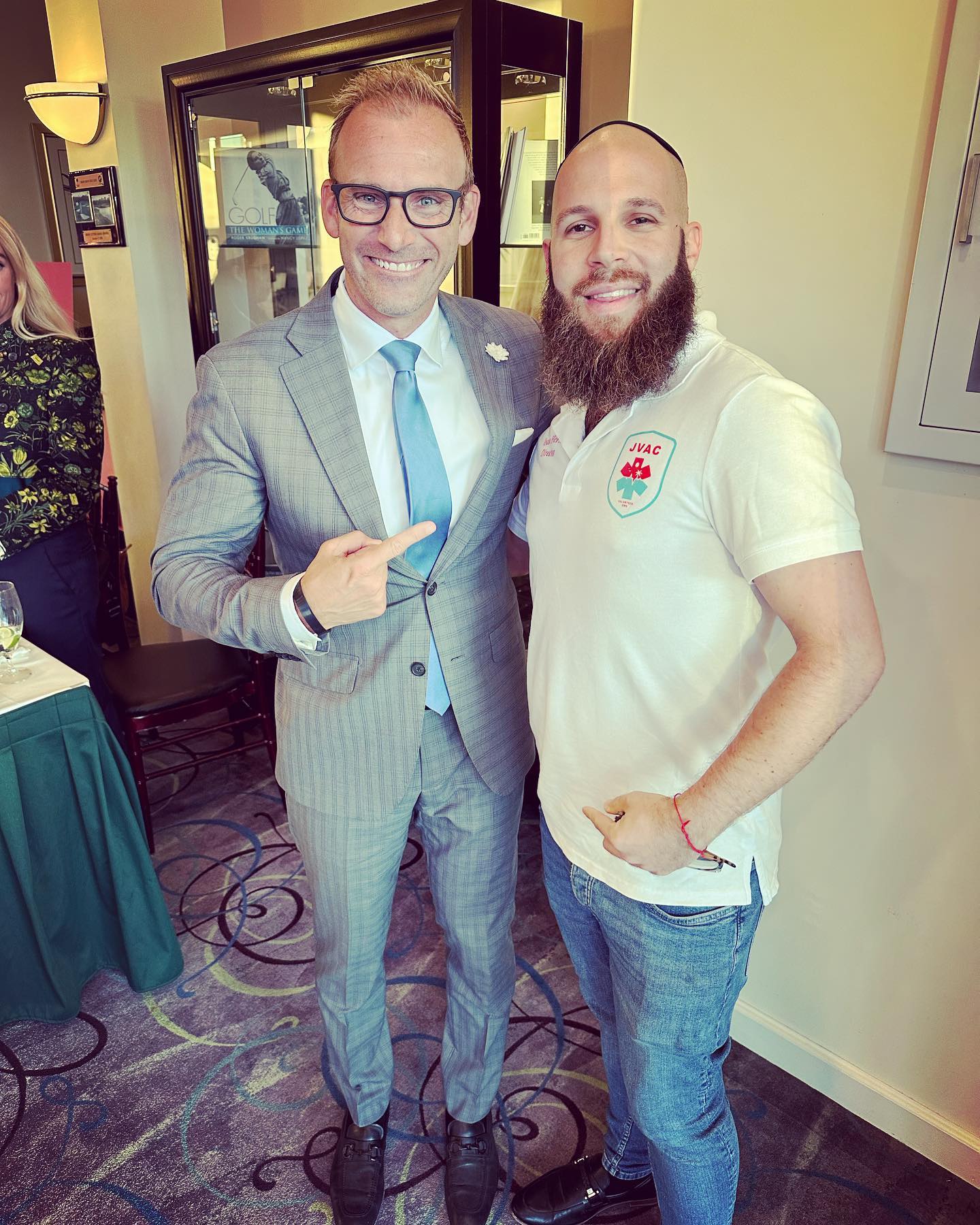 JVAC representative with a community leader at a South Florida event